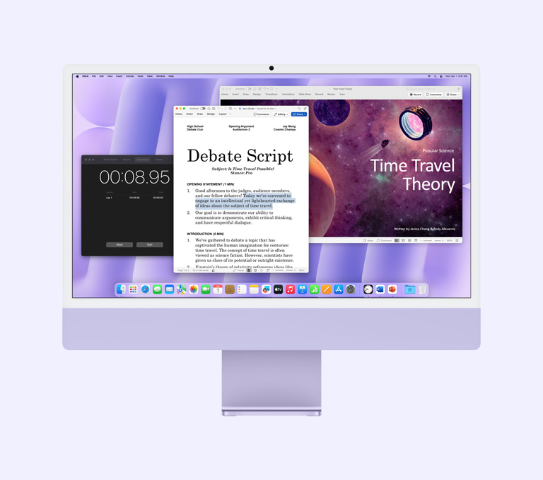 Lila iMac, képernyőjén a Microsoft Word, a Microsoft PowerPoint és az Óra alkalmazással